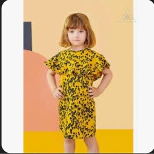 Charming Yellow and Black Boutique Dress. Euro 110/116
